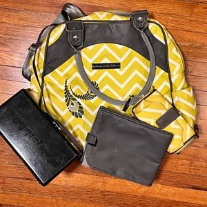 Petunia Pickle Bottom diaper bag/backpack/purse and wallet.